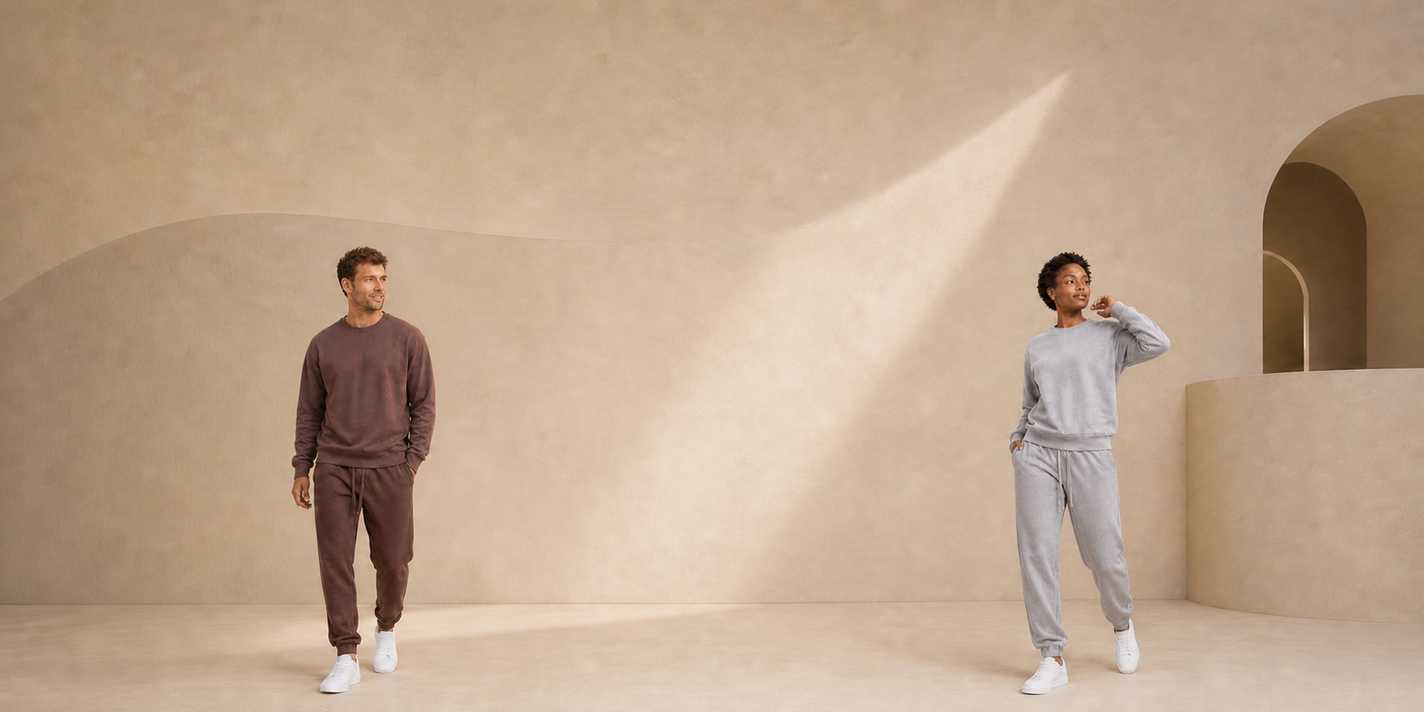 Motus Gratis adult collection with man in brown and woman in gray coordinated sets, desktop hero