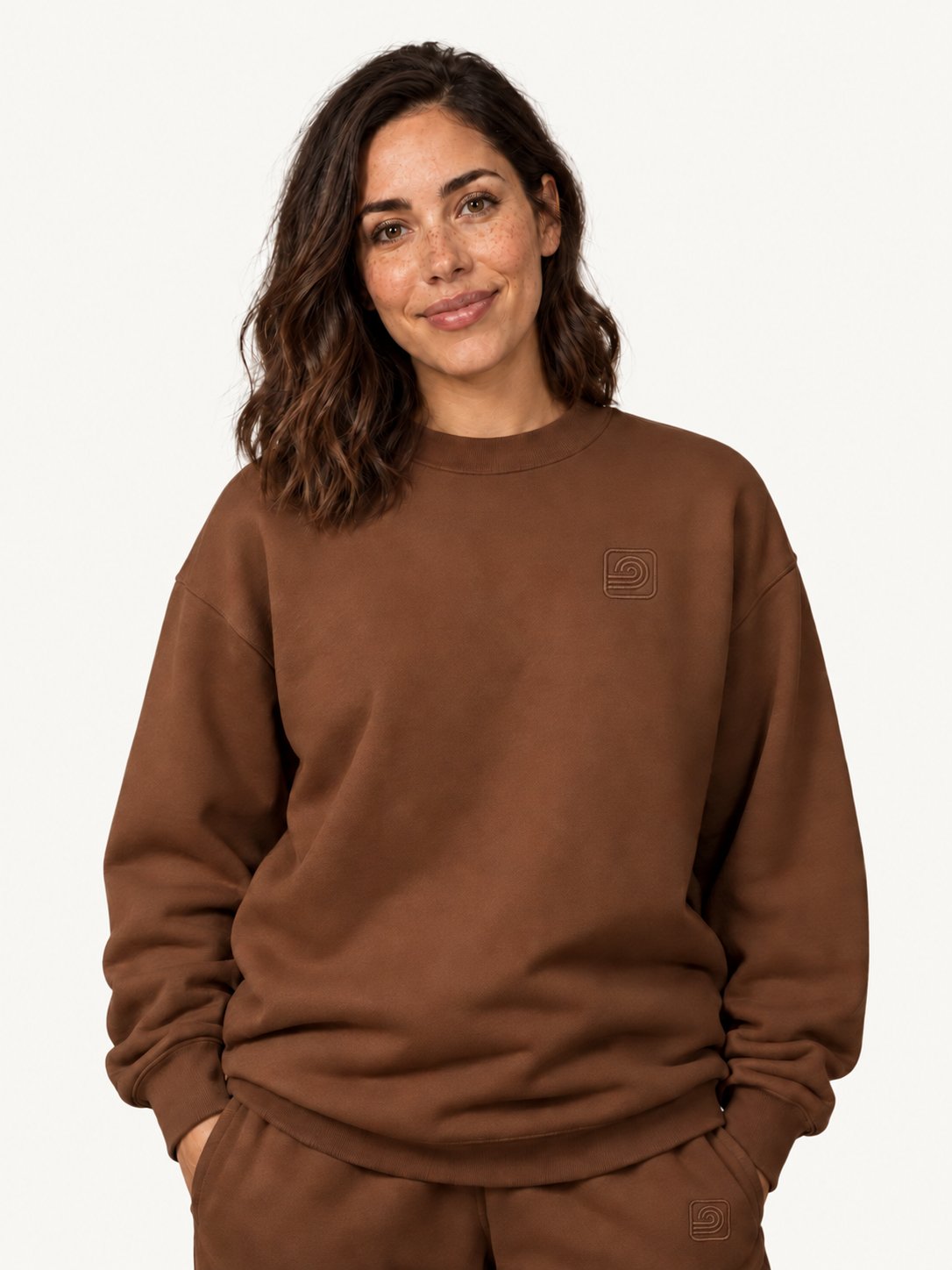 Women's brown Infinitum sweatshirt on fashion model — front portrait