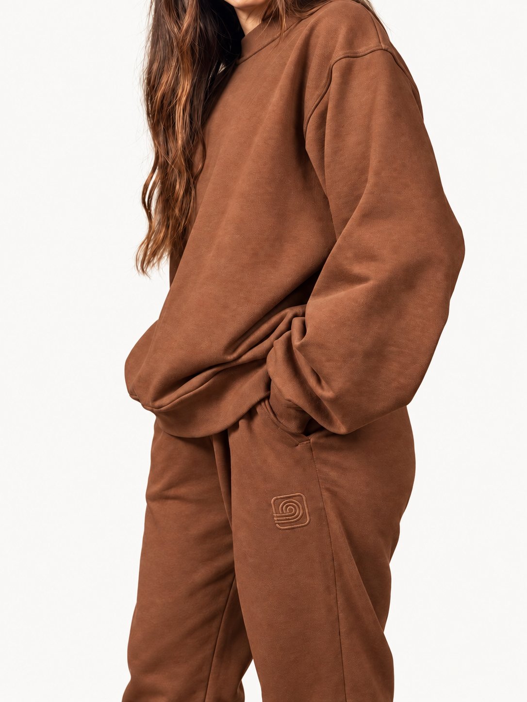 Women's brown Pura sweatpants — fashion model wearing size S — pocket detail